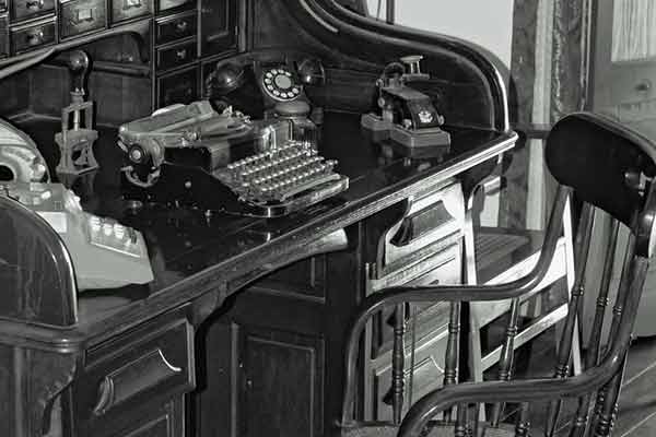 Roll Top Desk with Typewriter and Vintage Calculator