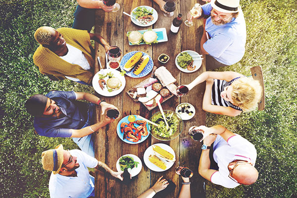 Friends enjoying meal outdoors