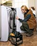 Woman Attempting to Fix a Washer Machine
