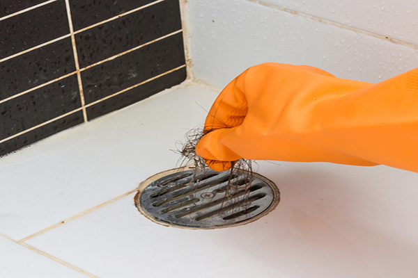 https://cdn.frontdoorhome.com/ahs/blog/prod/static/static-srvm/ahs/home-matters-images/shower_drain_clog_600x400.jpg